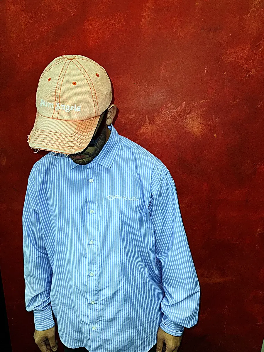 BDJ — studio portrait, head down
